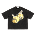 Burning Camera Tee by Real Experience featuring a flaming vintage camera graphic on a textured black t-shirt.